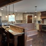 kitchen island and booth seats with wooden furniture legs