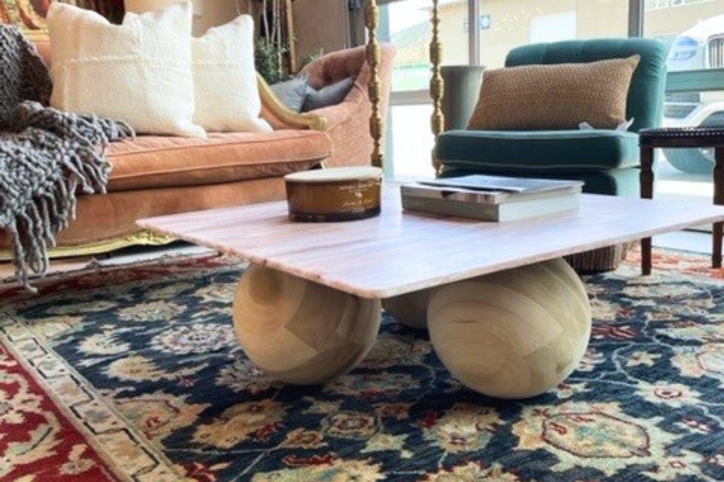 Custom table made with hardwood balls as legs