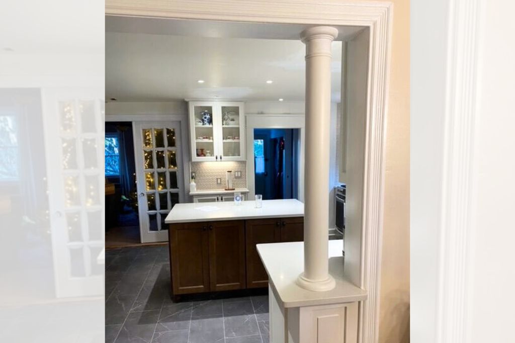 white kitchen island pillar from counter to ceiling
